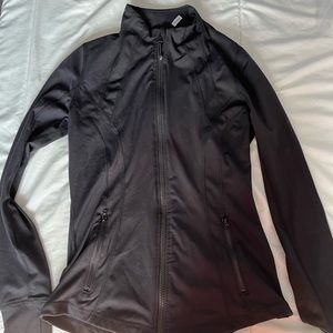 Size small, womens black athletic zip up jacket/sweater. Tight fit.